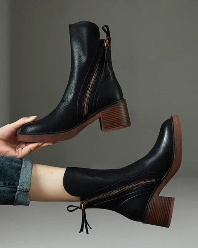 Garciel | Black leather ankle boots with comfortable heels, elegant and timeless